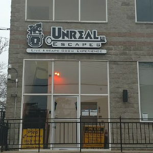 Unreal Escapes - Staten Island's Premiere Live Escape Room - Logo